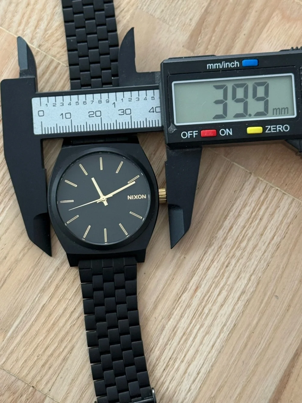 Nixon Minimal The Time Traveler Black Stainless Case Bracelet Gold Hands Markers